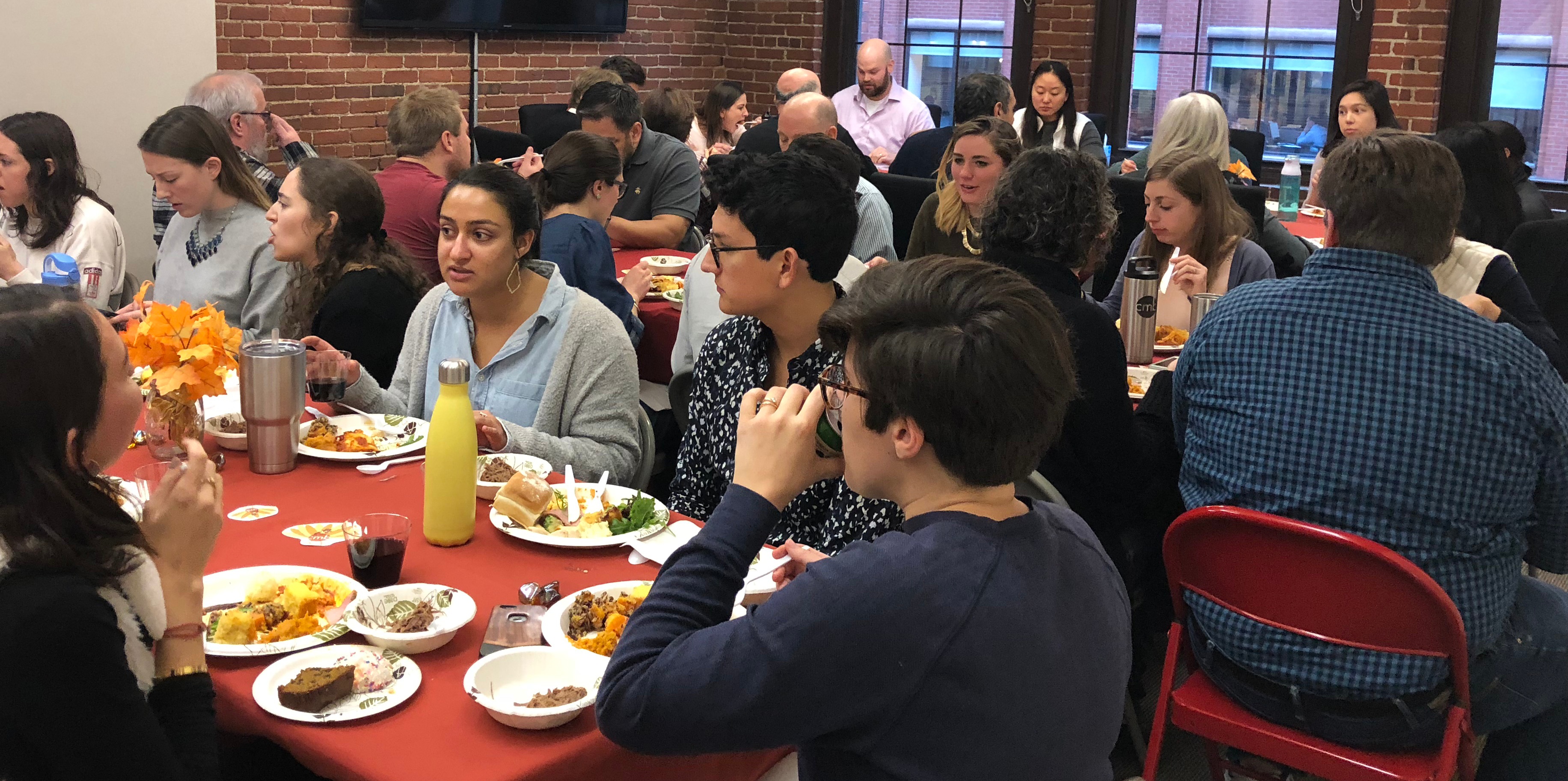 Group eating at Thanksgiving